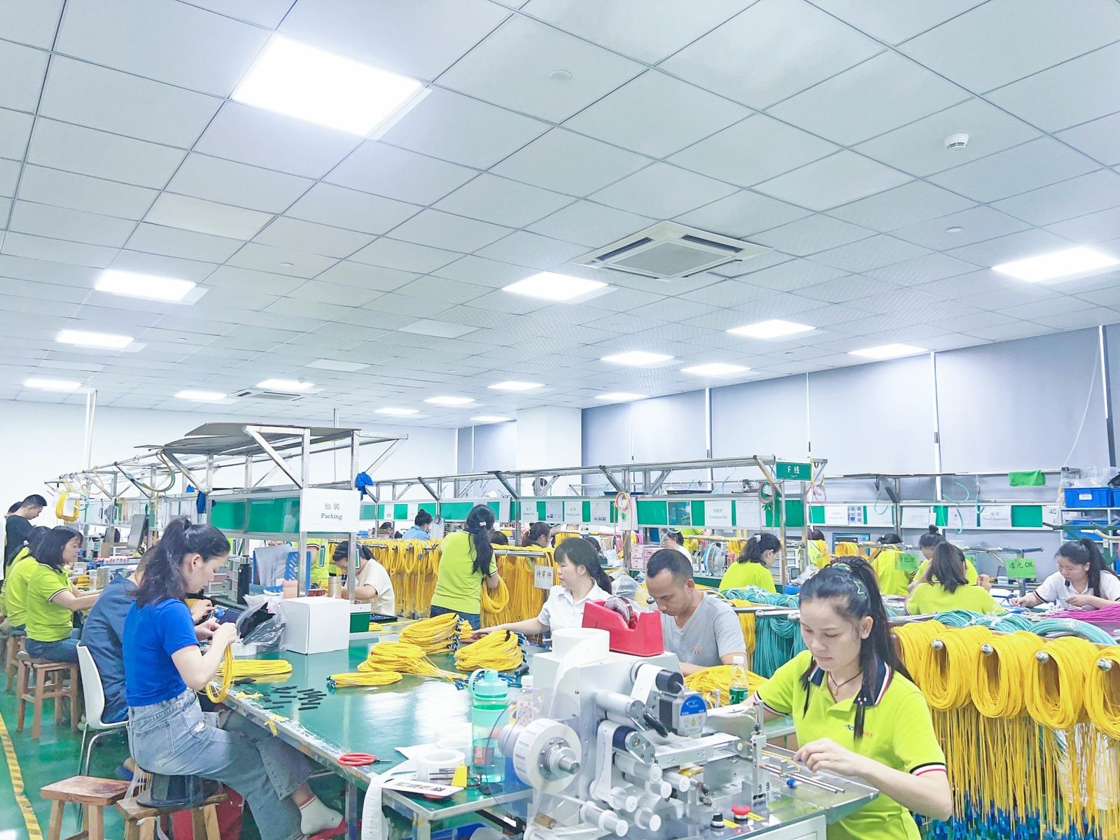 High-volume fiber optic assembly line at JHT NetFiber